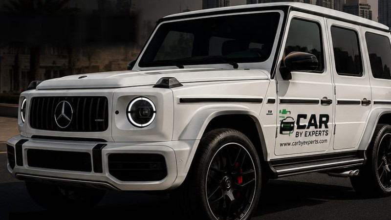 Luxury SUV — white Mercedes G-Wagon with Car By Experts branding