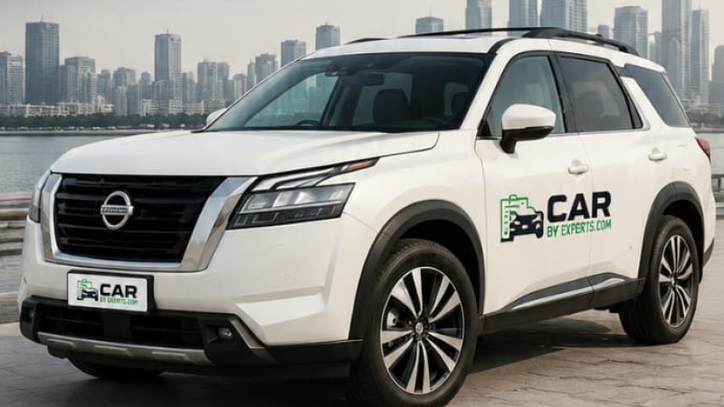 SUV — white Nissan Pathfinder with Car By Experts branding
